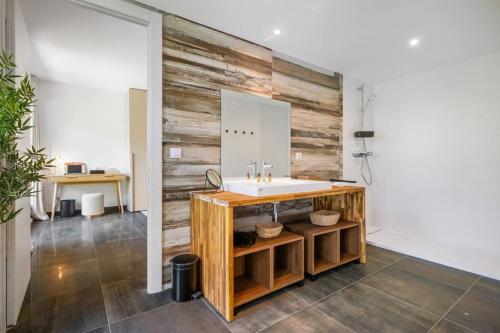 a bathroom with a sink and a mirror at Villa Romy, a World apart in Roquebrune-Cap-Martin