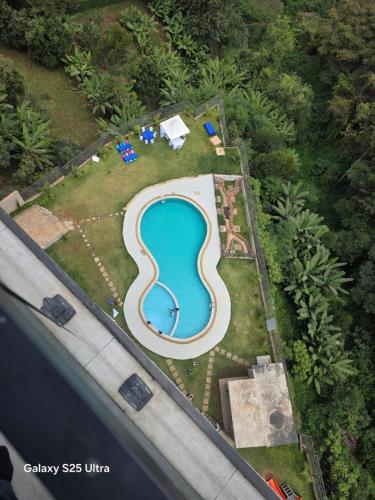 an overhead view of a swimming pool in a yard at Kitusiru Falls Retreat, in Kanyongo