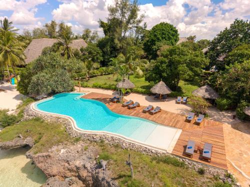 an aerial view of a resort pool and beach at Pongwe Beach Hotel in Pongwe