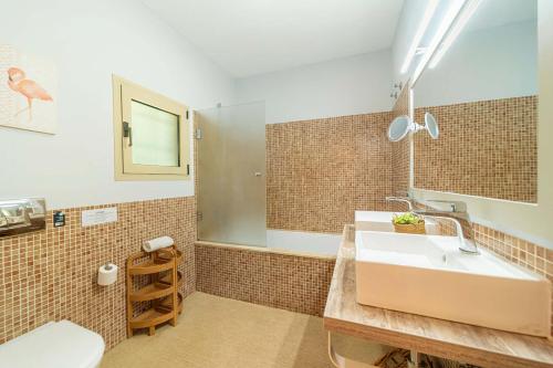 a bathroom with a sink and a toilet at Villa Calvario by Sealand Villas in Pollença
