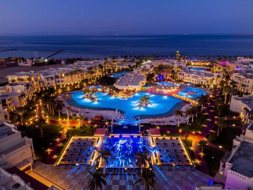 an aerial view of a city at night at Rixos Sharm El Sheikh - Adults Only 18 Plus in Sharm El Sheikh
