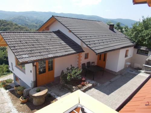 an aerial view of a house with a roof at Prima Apartment in Podbočje