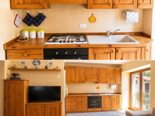 a kitchen with wooden cabinets and a stove top oven at casa zanna bianca in Vione