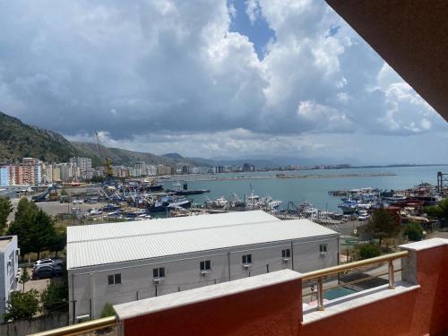 a view of a body of water from a building at Marina View in Shëngjin