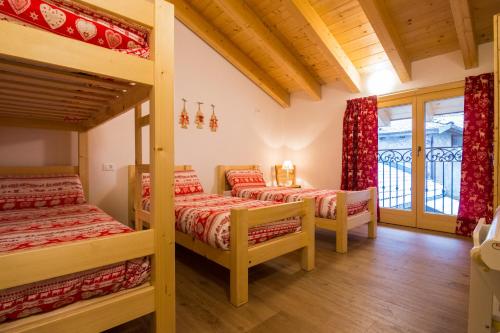 A bed or beds in a room at Olimpic Hostel