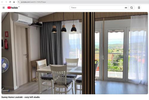 Sunny Home Loutraki is a modern studio with views of the bay and mountains with private parking