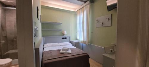 Et bad på Hotel Camilla Guelfa