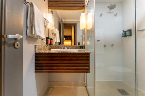 Um banheiro em Hotel Deville Prime Maringá