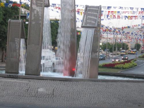 a water fountain in the middle of a street at Apartments Petah Tiqwa - Bar Kochva Street in Petaẖ Tiqwa