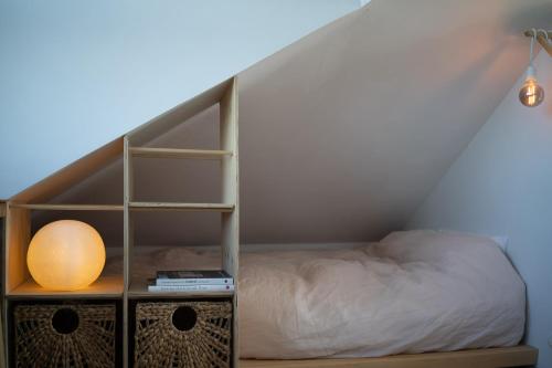 a bed in a room with a bed gmaxwell at Solhaven in Selfoss