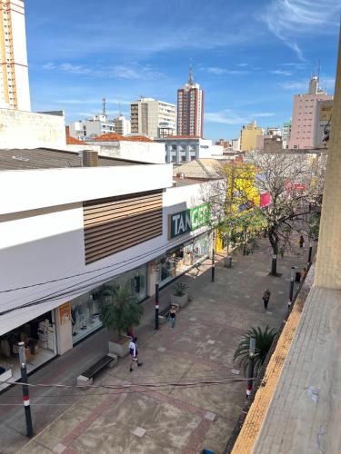 an overhead view of a city street with buildings at Hotel Palace Huesca in Presidente Prudente