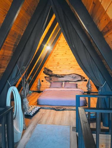 a bedroom with a bed in a tent at Dilek Alagöz in Sapanca