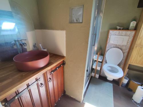 a bathroom with a sink and a toilet at Loft in a quiet condominium in Vitry-sur-Seine