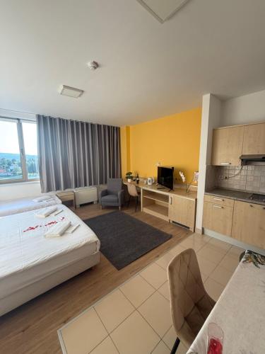 En eller flere senge i et værelse på Hotel Epic