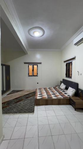 a large room with a large bed in it at Chez YaZ in Nouakchott