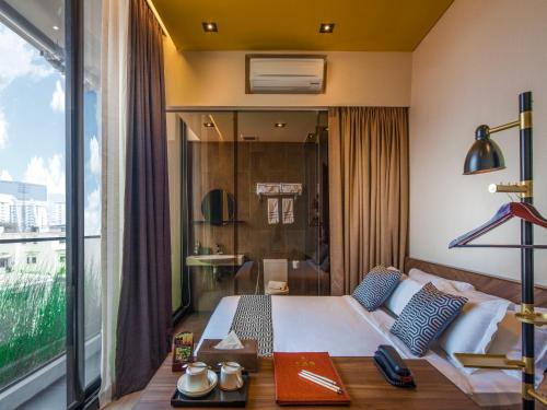 Postel nebo postele na pokoji v ubytování Hotel Yan