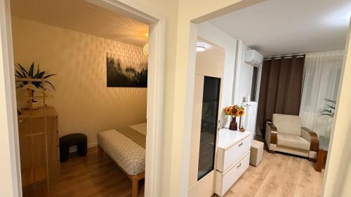 a bedroom with a bed and a dresser and a mirror at Studio 13 Warsaw in Warsaw