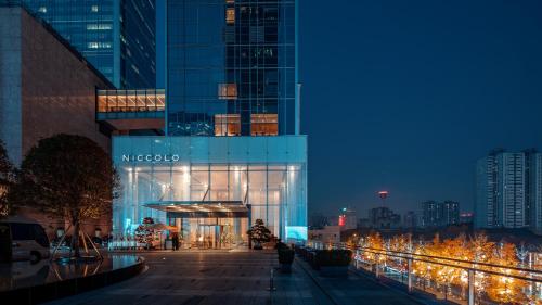 a view of a building at night with lights at Niccolo Chengdu in Chengdu