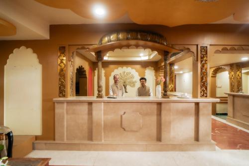 a kitchen with an island in the middle of a room at Chokhi Dhani The Palace Hotel in Jaisalmer