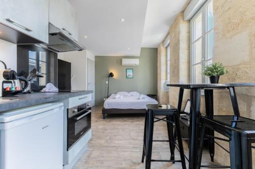 Bel appartement lumineux avec climatisation et pierre Bordelaise pour 2p