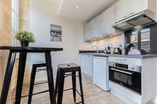 Bel appartement lumineux avec climatisation et pierre Bordelaise pour 2p