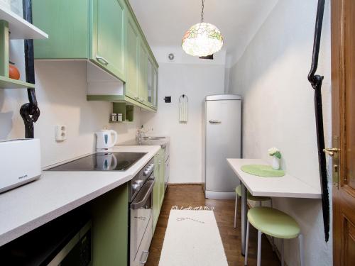 Kuchyň nebo kuchyňský kout v ubytování Calandra Apartment