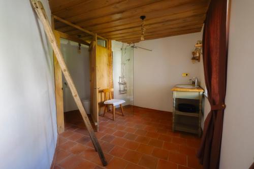 a room with a sink and a table and a chair at Polixenia Culinary Estate 