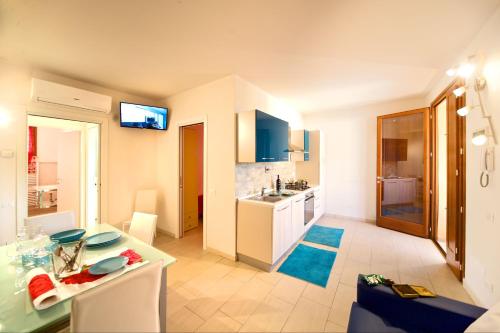 a kitchen with a sink and a counter top at Piper Residence in Puntone di Scarlino