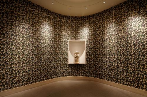 a room with a wall with black and silver wallpaper at Hotel Monte Hermana Fukuoka in Fukuoka