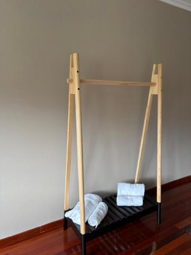 a bed with two white pillows on a shelf at Lar de Luz in Palas de Rei
