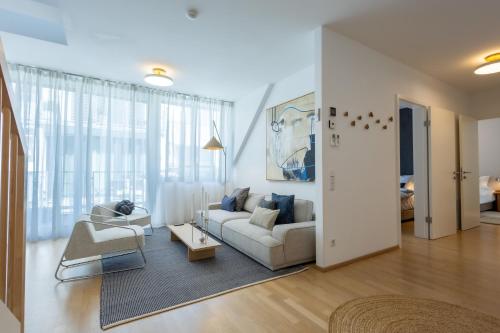 Dachgeschoss-Maisonette mit Terrasse am Karlsplatz