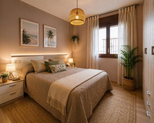 a bedroom with a large bed and a window at Miquel 2 – Apartamento con Parking, Wifi y A/C in Tossa de Mar