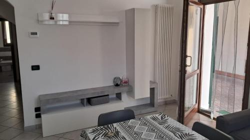 a living room with a couch and a table at 95 by Le Suite in Lugo