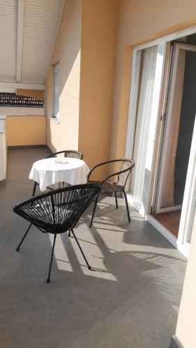 a bench with a table in a building at Apartments Tutto Bene in Jajce
