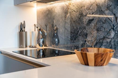 a kitchen with a sink and a counter at Lake Rental Inpro 89 in Mikołajki