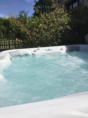 un bain à remous dans l'établissement Loft P'tite Pomme Azay le Rideau, à Azay-le-Rideau