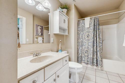 a bathroom with a sink and a toilet and a shower at B BY THE C in Ocean City