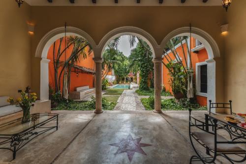 an entry way to a house with a star on the floor at Casa Jade Hotel - Adults Only, Mérida in Mérida