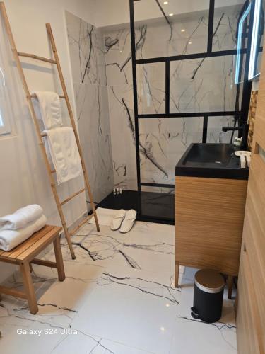 a bathroom being remodeled with a sink and a counter at La lézarde in Cavalaire-sur-Mer