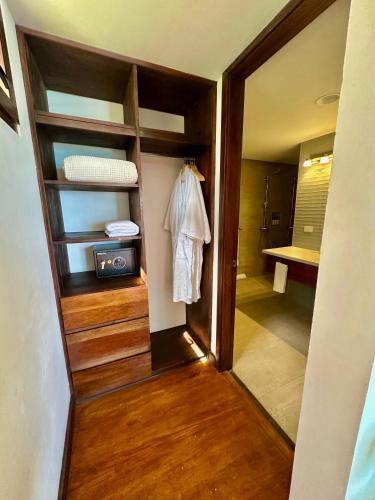 a room with a closet with a radio in it at Bliss Resort in San Juan del Sur