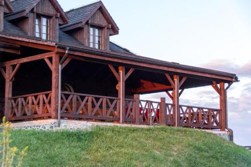 a wooden pavilion on top of a hill at Karczma Zamojszczyzna in Zamość