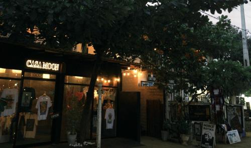 a store with a tree in front of it at Casa Moon Trincomalee Beach House in Trincomalee