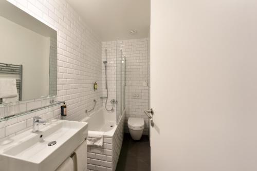 Un baño de Hôtel Pax