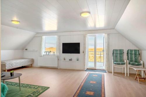 a large living room with a flat screen tv at 729-Thyboron-Vesterhavsgade-112 in Thyborøn