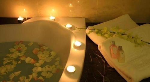 a bathroom with a toilet with lights on it at Au Lac 2 Hotel in Ho Chi Minh City