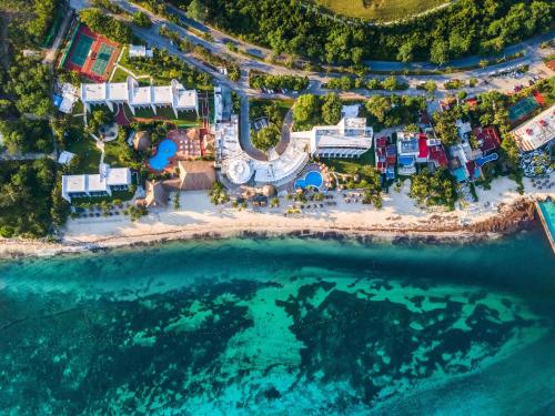 an aerial view of a resort and the ocean at Zel Cozumel in Cozumel