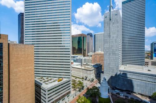 a view of a city skyline with tall buildings at CozySuites at LTV in Dallas