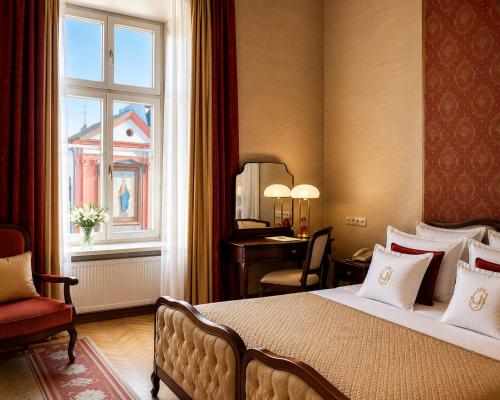 Кровать или кровати в номере Grand Hotel