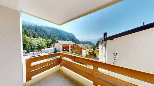 a balcony with a view of a mountain at Haus Belstar B in Naters