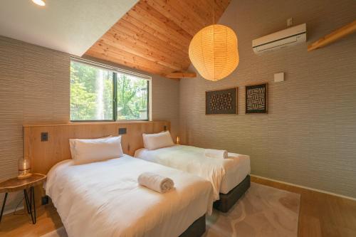 ECHOWOODS - Gorgeous 4-bed, 4-bath Brand New Home with Large Japanese Bath, Fireplace inside Echoland